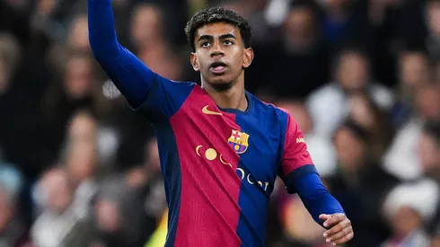 Lamine Yamal of FC Barcelona celebrates their team's third goal during the LaLiga match between Real Madrid CF and FC Barcelona at Estadio Santiago Bernabeu