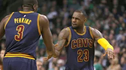 LeBron James #23 of the Cleveland Cavaliers reacts with Kendrick Perkins #3 against Boston Celtics after the second quarter in Game Four during the first round of the 2015 NBA Playoffs on April 26, 2015 at TD Garden in Boston, Massachusetts.