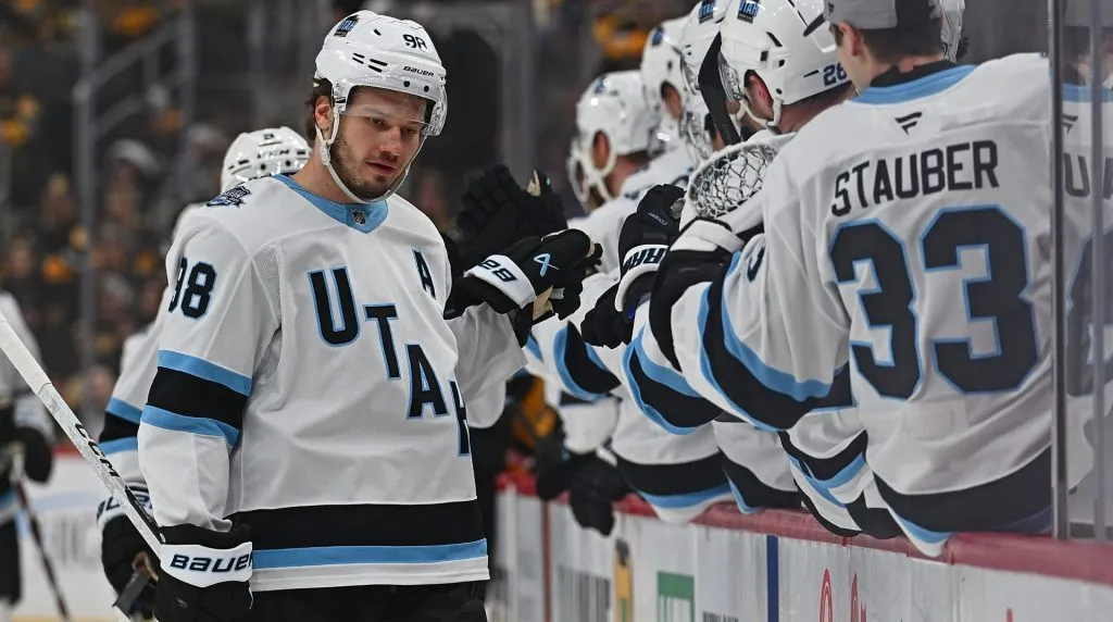 Mikhail Sergachev #98 of the Utah Hockey Club celebrates with teammates on the bench after scoring a goal in the first period during the game against the Pittsburgh Penguins at PPG PAINTS Arena on November 23, 2024 in Pittsburgh, Pennsylvania. (Photo by Justin Berl/Getty Images)