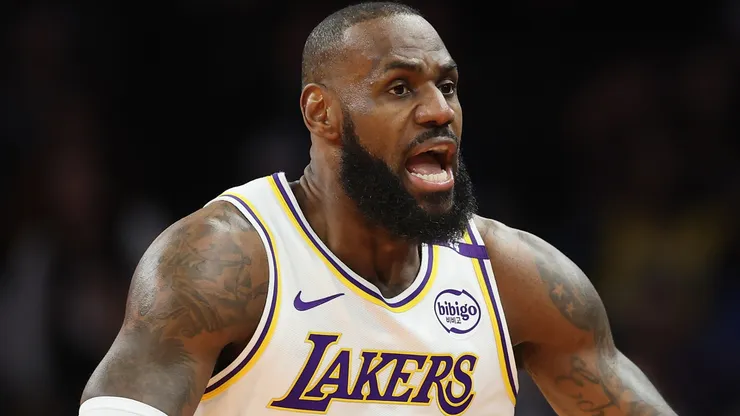 LeBron James #23 of the Los Angeles Lakers reacts during the first half of the Emirates NBA Cup game against the Phoenix Sunsat Footprint Center on November 26, 2024 in Phoenix, Arizona.