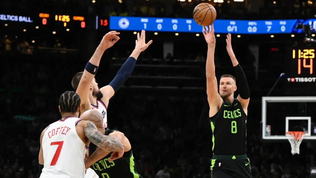 Kristaps Porzingis #8 of the Boston Celtics attempts a three-point basket against the LA Clippers during the first quarter at the TD Garden. (Brian Fluharty/Getty Images)