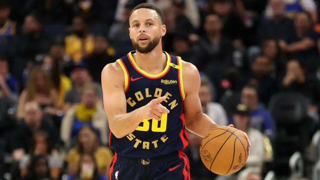 Stephen Curry #30 of the Golden State Warriors dribbles the ball against the Atlanta Hawks at Chase Center