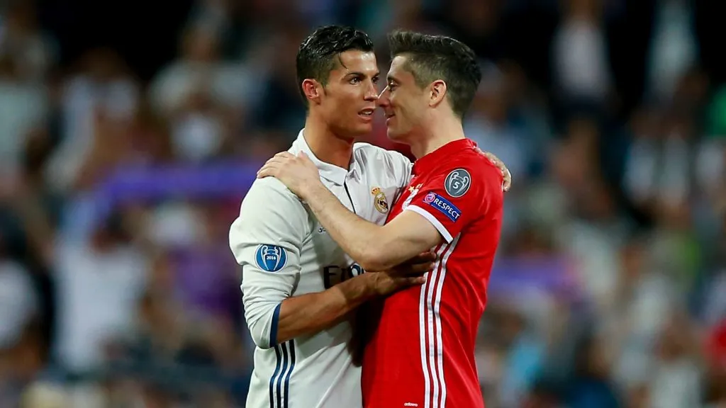 Cristiano Ronaldo (L) of Real Madrid CF clashes hands with Robert Lewandowski (R) of Bayern Muenchen after the UEFA Champions League Quarter Final second leg match between Real Madrid CF and FC Bayern Muenchen at Estadio Santiago Bernabeu on April 18, 2017 in Madrid, Spain.