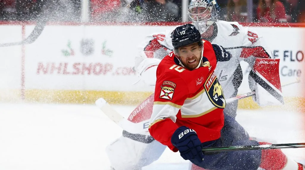 A.J. Greer #10 of the Florida Panthers and Logan Thompson #48 of the Washington Capitals collide during the first period of the game at Amerant Bank Arena on November 25, 2024 in Sunrise, Florida. (Photo by Megan Briggs/Getty Images)