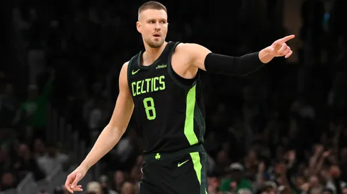 Kristaps Porzingis #8 of the Boston Celtics reacts after making a three-point basket against the LA Clippers during the first quarter at the TD Garden on November 25, 2024 in Boston, Massachusetts.