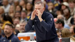Head coach Michael Malone of the Denver Nuggets shouts to his team while playing the Oklahoma City Thunder in the first quarter at Ball Arena on October 24, 2024 in Denver, Colorado.