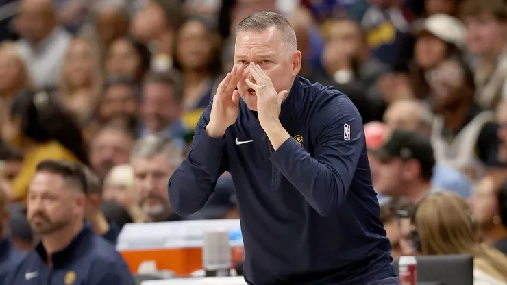Head coach Michael Malone of the Denver Nuggets shouts to his team while playing the Oklahoma City Thunder in the first quarter at Ball Arena on October 24, 2024 in Denver, Colorado.