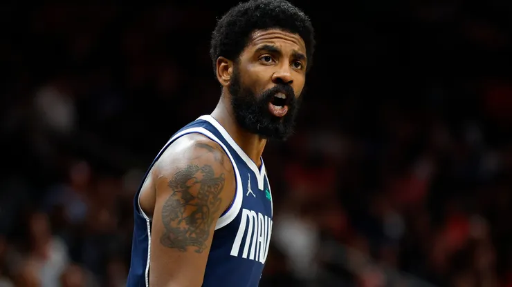 Kyrie Irving #11 of the Dallas Mavericks reacts during the third quarter against the Atlanta Hawks.