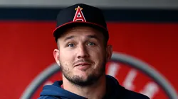 Mike Trout #27 of the Los Angeles Angels looks on from the dugout during the first inning against the Colorado Rockies at Angel Stadium of Anaheim on August 01, 2024 in Anaheim, California.