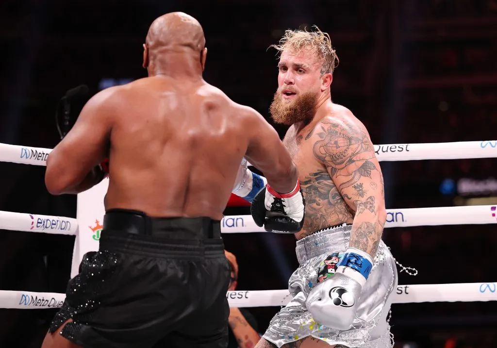 ARLINGTON, TEXAS – NOVEMBER 15: (L-R) Jake Paul and Mike Tyson fight during LIVE On Netflix: Jake Paul vs. Mike Tyson at AT&amp;T Stadium on November 15, 2024 in Arlington, Texas. (Photo by Al Bello/Getty Images for Netflix © 2024)