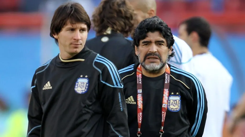 Diego Maradona conducts warm up exercises with forward Lionel Messi ahead of the 2010 FIFA World Cup match between Argentina and Nigeria. (Ezra Shaw/Getty Images)