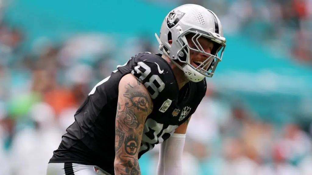 Maxx Crosby #98 of the Las Vegas Raiders reacts after a defensive stop in the second quarter of a game against the Miami Dolphins at Hard Rock Stadium on November 17, 2024 in Miami Gardens, Florida.