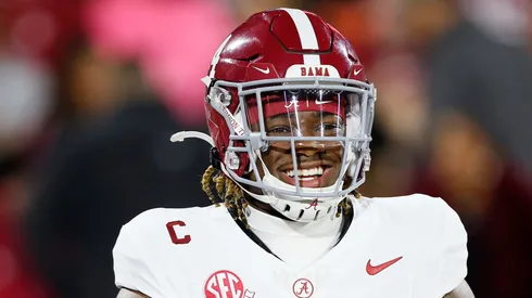 Quarterback Jalen Milroe #4 of the Alabama Crimson Tide smiles before a game against the Oklahoma Sooners at Gaylord Family Oklahoma Memorial Stadium on November 23, 2024 in Norman, Oklahoma.