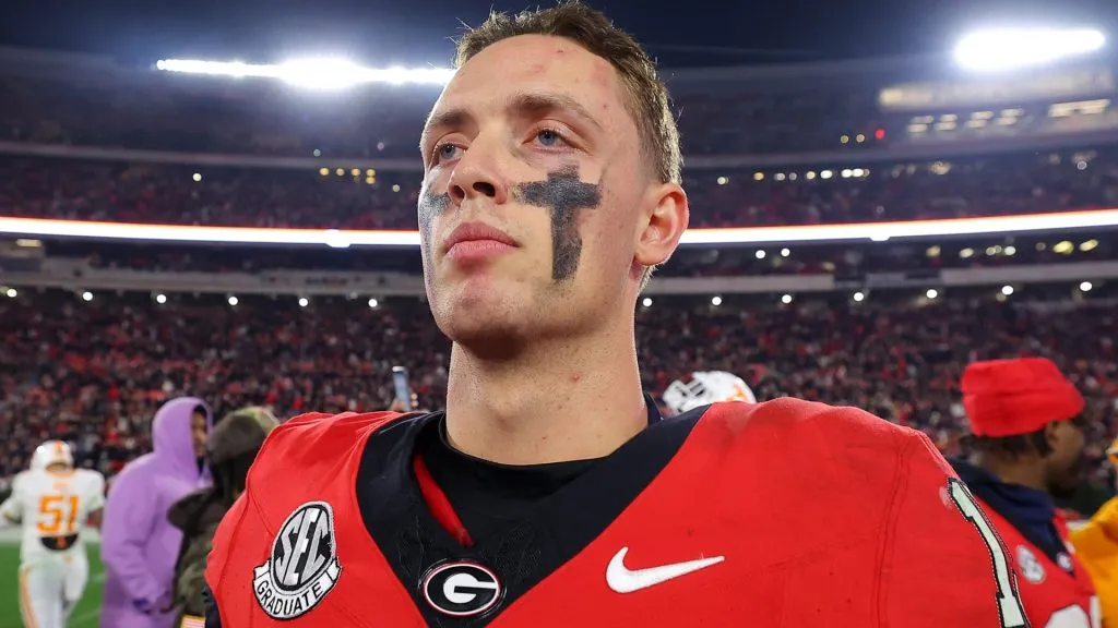 Carson Beck #15 of the Georgia Bulldogs looks on after defeating the Tennessee Volunteers 31-17 at Sanford Stadium on November 16, 2024 in Athens, Georgia.