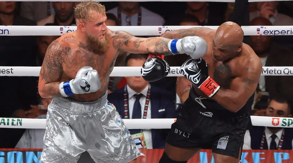Jake Paul throws a left on Mike Tyson during a heavyweight bout at AT&amp;T Stadium on November 15, 2024 in Arlington, Texas. (Photo by Christian Petersen/Getty Images)