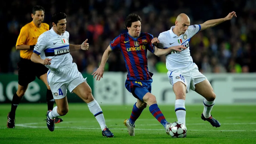 Lionel Messi of Barcelona is tackled by Javier Zanetti and Esteban Cambiasso of Inter Milan during the UEFA Champions League Semi Final Second Leg match between Barcelona and Inter Milan at Camp Nou. (Michael Regan/Getty Images)