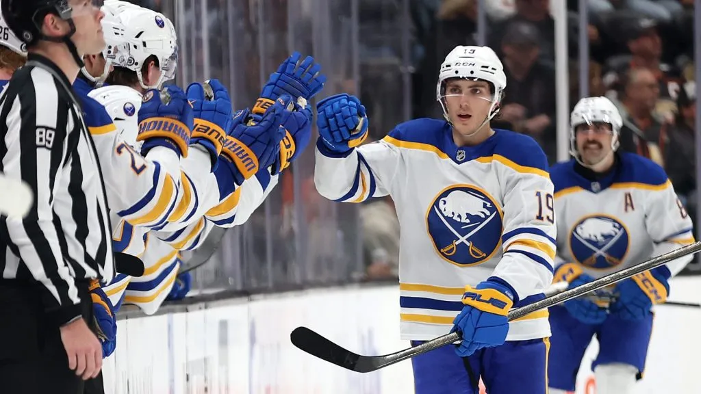 Peyton Krebs #19 of the Buffalo Sabres is congratulated at the bench after scoring a goal during the second period of a game against the Anaheim Ducks at Honda Center on November 22, 2024. (Source: Sean M. Haffey/Getty Images)
