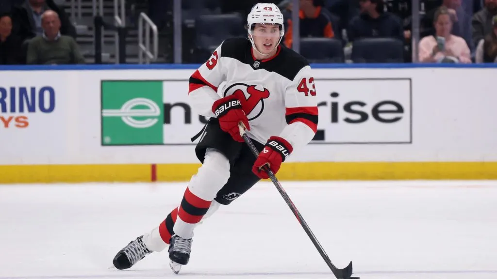 Luke Hughes #43 of the New Jersey Devils skates with the puck against the New York Islanders during their game at UBS Arena on November 09, 2024. (Source: Al Bello/Getty Images)