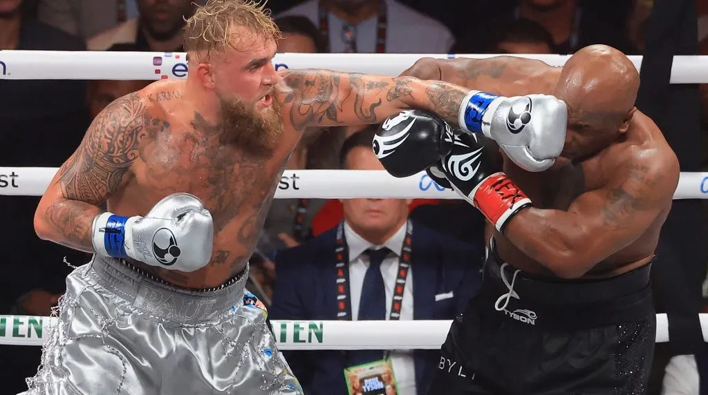 Jake Paul throws a left on Mike Tyson during a heavyweight bout at AT&amp;T Stadium on November 15, 2024 in Arlington, Texas. (Photo by Christian Petersen/Getty Images)
