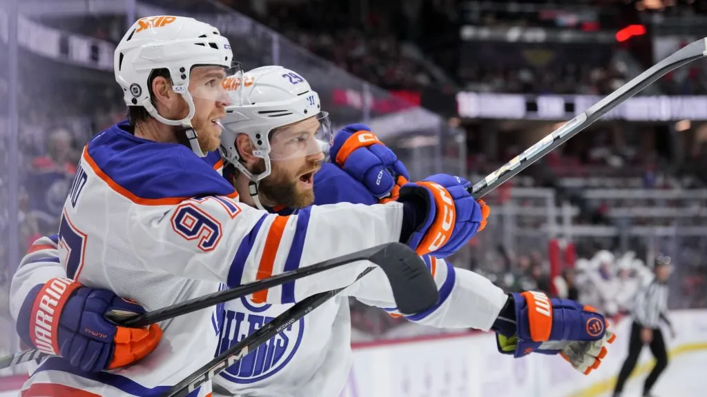 Connor McDavid #97 of the Edmonton Oilers celebrates his first period goal against the Ottawa Senators with Leon Draisaitl #29 at Canadian Tire Centre on November 19, 2024. (Source: Chris Tanouye/Freestyle Photography/Getty Images)