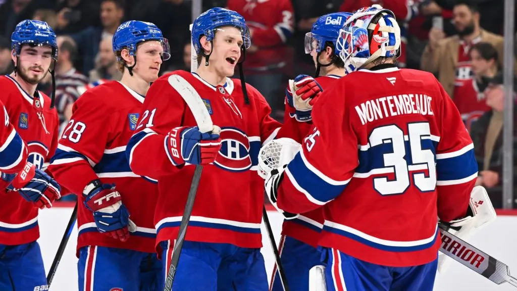 Kaiden Guhle #21 and goaltender Sam Montembeault #35 of the Montreal Canadiens celebrate a victory against the Edmonton Oilers at the Bell Centre on November 18, 2024. (Source: Minas Panagiotakis/Getty Images)