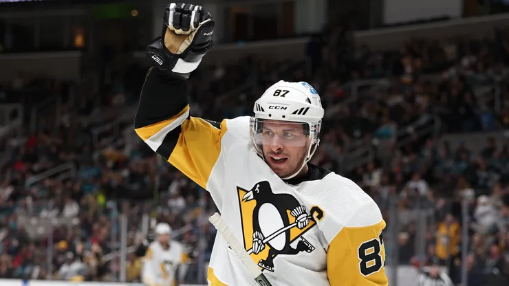 Sidney Crosby #87 of the Pittsburgh Penguins celebrates after Rickard Rakell #67 scored a goal against the San Jose Sharks in the first period at SAP Center on February 14, 2023.