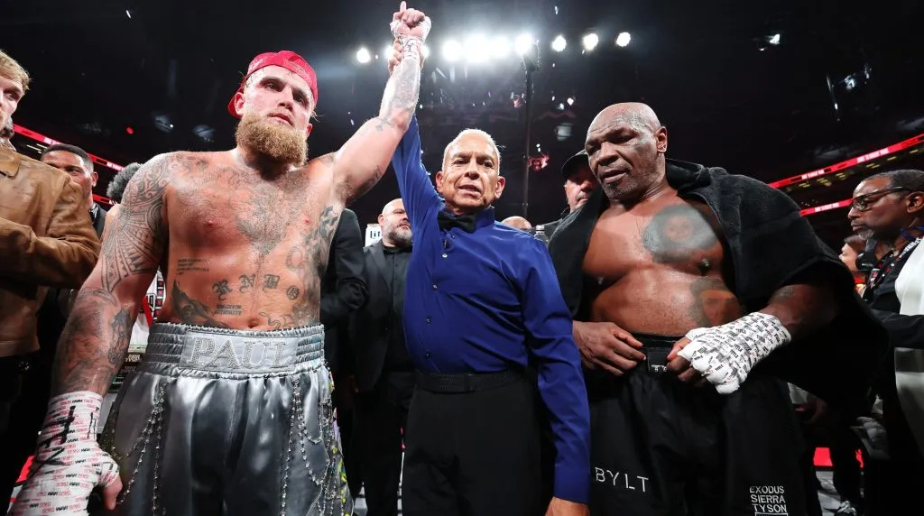 L-R) Jake Paul announced as winner against Mike Tyson during LIVE On Netflix: Jake Paul vs. Mike Tyson at AT&amp;T Stadium on November 15, 2024 in Arlington, Texas. (Photo by Al Bello/Getty Images for Netflix © 2024)