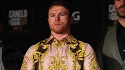 Boxer Canelo Alvarez poses with his championship belts at the end of the press conference during the press tour for his fight against Gennady Golovkin in New York City.