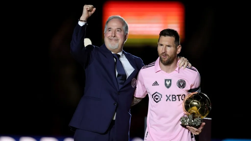 Inter Miami CF owners Jorge Mas celebrates with Lionel Messi #10 of Inter Miami CF as he holds his trophy during the Ballon d'Or trophy presentation at DRV PNK Stadium on November 10, 2023 in Fort Lauderdale, Florida.