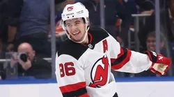 Jack Hughes #86 of the New Jersey Devils celebrates after scoring the winning overtime goal against the New York Islanders during their game at UBS Arena on November 09, 2024 in Elmont, New York.