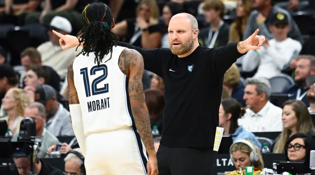Head Coach Taylor Jenkins of the Memphis Grizzlies speaks to Ja Morant #12 during the second quarter against the Utah Jazz at Delta Center on October 23, 2024 in Salt Lake City, Utah.  (Photo by Alex Goodlett/Getty Images)