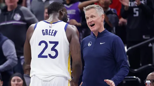 Draymond Green #23 of the Golden State Warriors talks to head coach Steve Kerr after receiving a technical foul in the fourth quarter against the Sacramento Kings during the NBA In-Season Tournament game at Golden 1 Center.