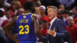 Head coach Steve Kerr of the Golden State Warriors speaks to Draymond Green #23 during a timeout against the Toronto Raptors in the first half during Game Two of the 2019 NBA Finals at Scotiabank Arena on June 02, 2019 in Toronto, Canada.