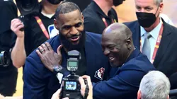 Michael Jordan and LeBron James hug after the presentation of the NBA 75th Anniversary Team during the 2022 NBA All-Star Game at Rocket Mortgage Fieldhouse on February 20, 2022 in Cleveland, Ohio.