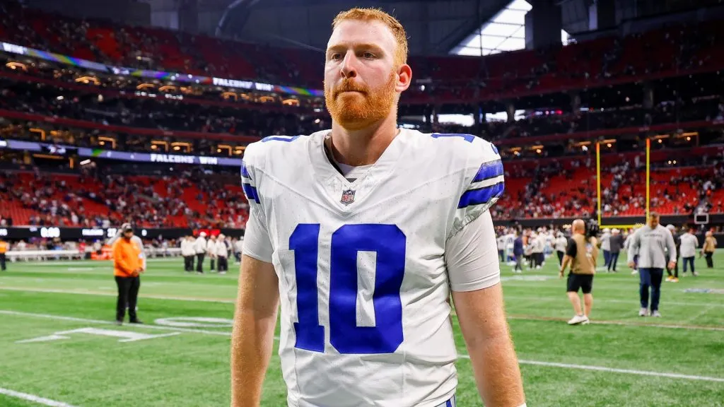 Cooper Rush #10 of the Dallas Cowboys walk off the field after a loss to the Atlanta Falcons at Mercedes-Benz Stadium on November 03, 2024. (Source: Todd Kirkland/Getty Images)