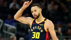 Stephen Curry #30 of the Golden State Warriors reacts after the Warriors scored a basket against the Atlanta Hawks in the second half at Chase Center on November 20, 2024 in San Francisco, California.