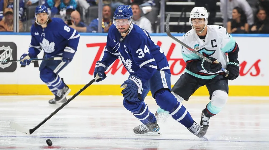 Jordan Eberle #7 of the Seattle Kraken skates after Auston Matthews #34 of the Toronto Maple Leafs during the Second period in an NHL game at Scotiabank Arena in Toronto, Ontario, Canada. (Photo by Claus Andersen/Getty Images)