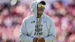 Head coach Deion Sanders of the Colorado Buffaloes walks across the field before the game against the Texas Tech Red Raiders at Jones AT&T Stadium on November 09, 2024 in Lubbock, Texas.