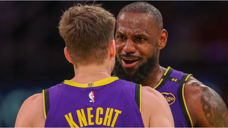 LeBron James #23 of the Los Angeles Lakers celebrates his dunk with teammate Dalton Knecht #4 while playing the Utah Jazz during the fourth quarter of the Emirates NBA Cup at Crypto.com Arena on November 19, 2024 in Los Angeles, California.