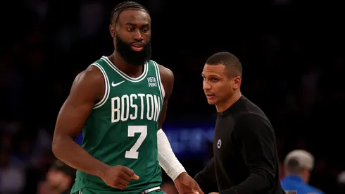 Jaylen Brown #7 of the Boston Celtics is greeted by head coach Joe Mazzulla as he heads to the bench at Madison Square Garden on October 25, 2023.