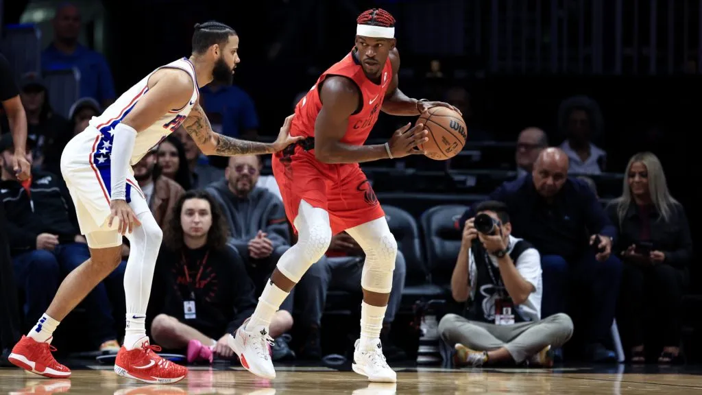 Jimmy Butler #22 of the Miami Heat controls the ball ahead of Caleb Martin #16 of the Philadelphia 76ers during the first half at Kaseya Center. (Carmen Mandato/Getty Images)