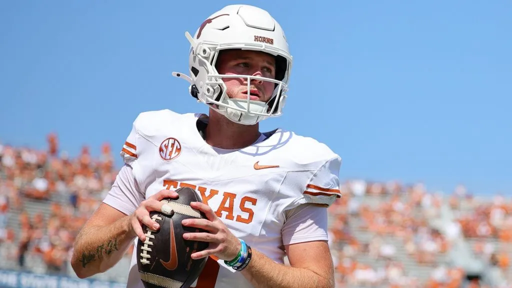 Quinn Ewers #3 of the Texas Longhorns warms up prior to a game against the Oklahoma Sooners at Cotton Bowl Stadium on October 12, 2024. (Source: Alex Slitz/Getty Images)