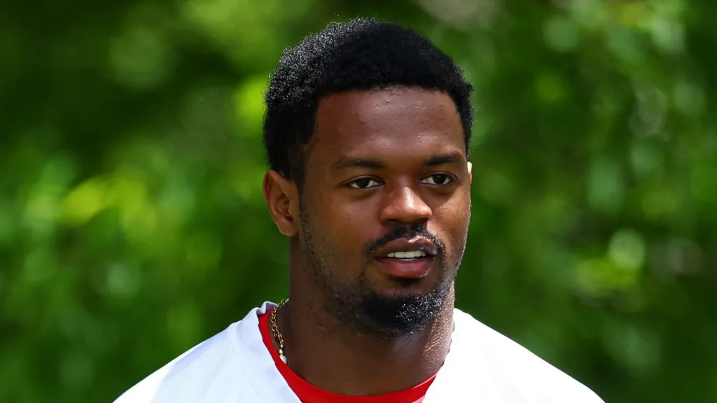 Tyquan Thornton #11 of the New England Patriots walks to the field during the New England Patriots OTA Offseason Workout on May 29, 2024 in Foxborough, Massachusetts.