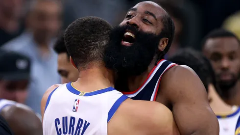 James Harden of the LA Clippers hugs Stephen Curry of the Golden State Warriors on November 18, 2024.
