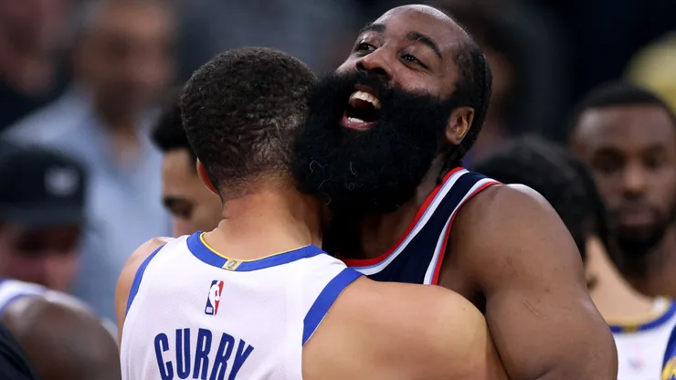 James Harden of the LA Clippers hugs Stephen Curry of the Golden State Warriors on November 18, 2024.