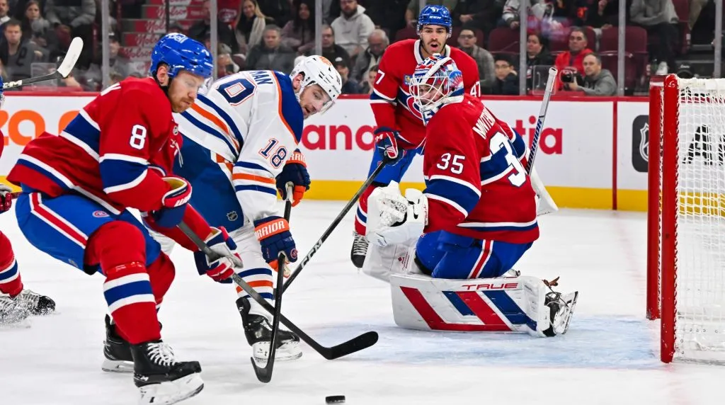Goaltender Sam Montembeault #35 of the Montreal Canadiens tends the net as Zach Hyman #18 of the Edmonton Oilers skates for the puck during the first period at the Bell Centre on November 18, 2024 in Montreal, Quebec, Canada. (Photo by Minas Panagiotakis/Getty Images)