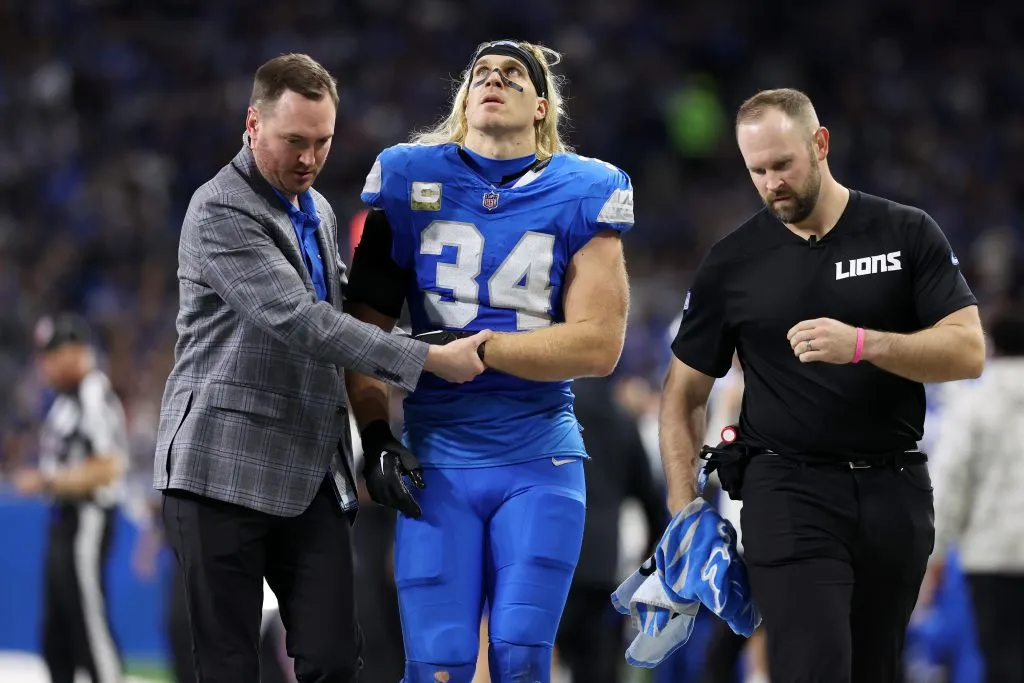 DETROIT, MICHIGAN – NOVEMBER 17: Alex Anzalone #34 of the Detroit Lions is helped off the field after being injured during a play in the second quarter of a game against the Jacksonville Jaguars at Ford Field on November 17, 2024 in Detroit, Michigan. (Photo by Gregory Shamus/Getty Images)