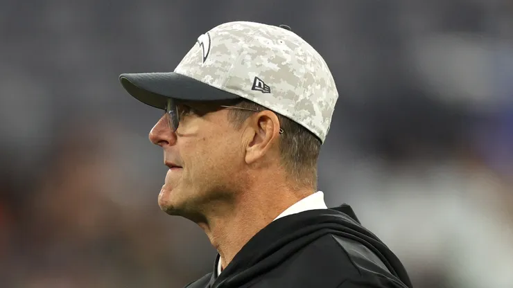 Head coach Jim Harbaugh of the Los Angeles Chargers catches a ball before the game against the Cincinnati Bengals at SoFi Stadium on November 17, 2024 in Inglewood, California.