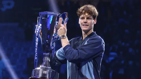 Jannik Sinner of Italy poses for a photo with the ATP Finals trophy after his victory against Taylor Fritz of United States