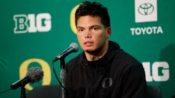 Dillon Gabriel #8 of the Oregon Ducks talks with media after the win over Wisconsin Badgers at Camp Randall Stadium on November 16, 2024 in Madison, Wisconsin.